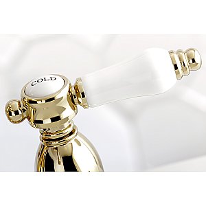 Kingston Brass 4-Inch Centerset Lavatory Faucet - Metal and Porcelain Levers - Polished Brass