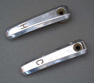Antique âScrew Downâ faucet handles