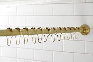 Kingston Brass SRK607 Edenscape 60"-72" Stainless Steel Adjustable Tension Shower Curtain Rod with Rings - Brushed Brass