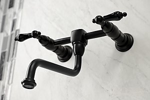 Kingston Brass KS1210PKL Duchess Wall Mount Bathroom Faucet, Matte Black