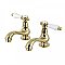 Kingston Brass Heritage Basin Faucet - Porcelain Lever Handles - Polished Brass