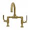 Kingston Brass KS2177KL Whitaker Industrial Style Bridge Bathroom Faucet with Pop-Up Drain, Brushed Brass